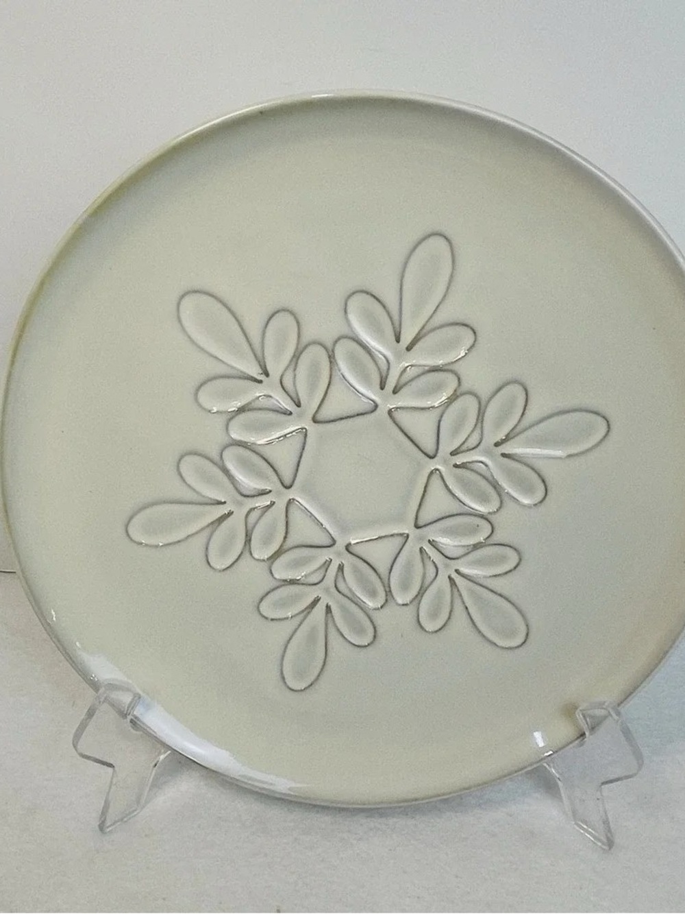 Elegant Cream Ceramic Decorative Plate with Floral Relief